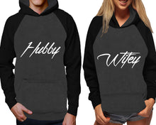 Load image into Gallery viewer, Hubby and Wifey raglan hoodies, Matching couple hoodies, Black Charcoal his and hers man and woman contrast raglan hoodies
