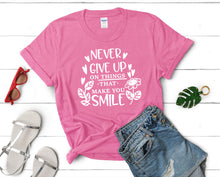 Load image into Gallery viewer, Never Give Up On Things That Make You Smile t shirts for women. Custom t shirts, ladies t shirts. Pink shirt, tee shirts.