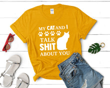 Load image into Gallery viewer, My Cat and I Talk Shit About You t shirts for women. Custom t shirts, ladies t shirts. Gold shirt, tee shirts.