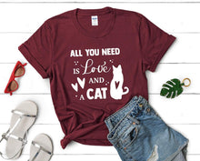 Load image into Gallery viewer, All You Need is Love and a Cat t shirts for women. Custom t shirts, ladies t shirts. Maroon shirt, tee shirts.