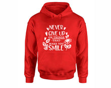 Load image into Gallery viewer, Never Give Up On Things That Make You Smile inspirational quote hoodie. Red Hoodie, hoodies for men, unisex hoodies