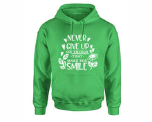 Load image into Gallery viewer, Never Give Up On Things That Make You Smile inspirational quote hoodie. Irish Green Hoodie, hoodies for men, unisex hoodies