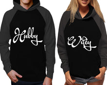 Cargar imagen en el visor de la galería, Hubby and Wifey raglan hoodies, Matching couple hoodies, Charcoal Black his and hers man and woman contrast raglan hoodies
