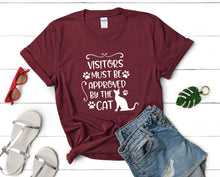 Load image into Gallery viewer, Visitors Must Be Approved By The Cat t shirts for women. Custom t shirts, ladies t shirts. Maroon shirt, tee shirts.
