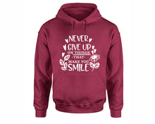 Load image into Gallery viewer, Never Give Up On Things That Make You Smile inspirational quote hoodie. Maroon Hoodie, hoodies for men, unisex hoodies
