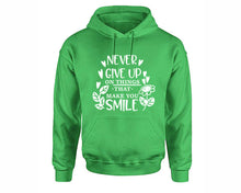 Load image into Gallery viewer, Never Give Up On Things That Make You Smile inspirational quote hoodie. Irish Green Hoodie, hoodies for men, unisex hoodies
